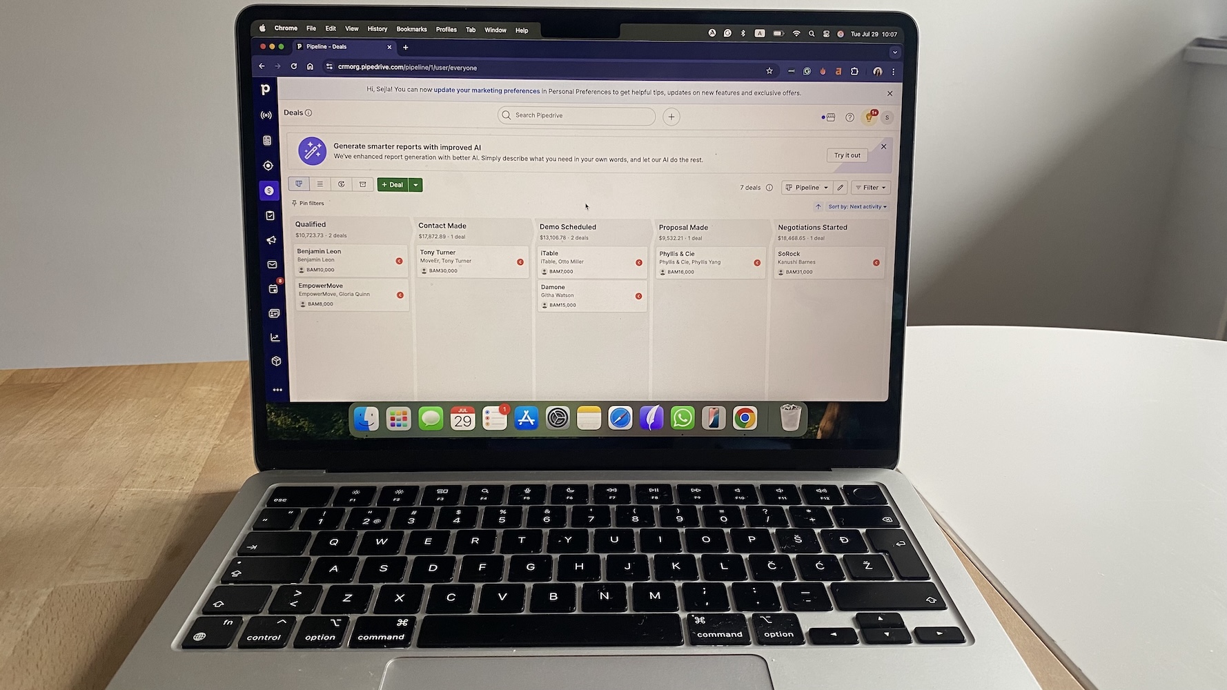 Pipedrive CRM pipeline board with deals organized by stage, showing columns for qualified, contact made, and demo scheduled.